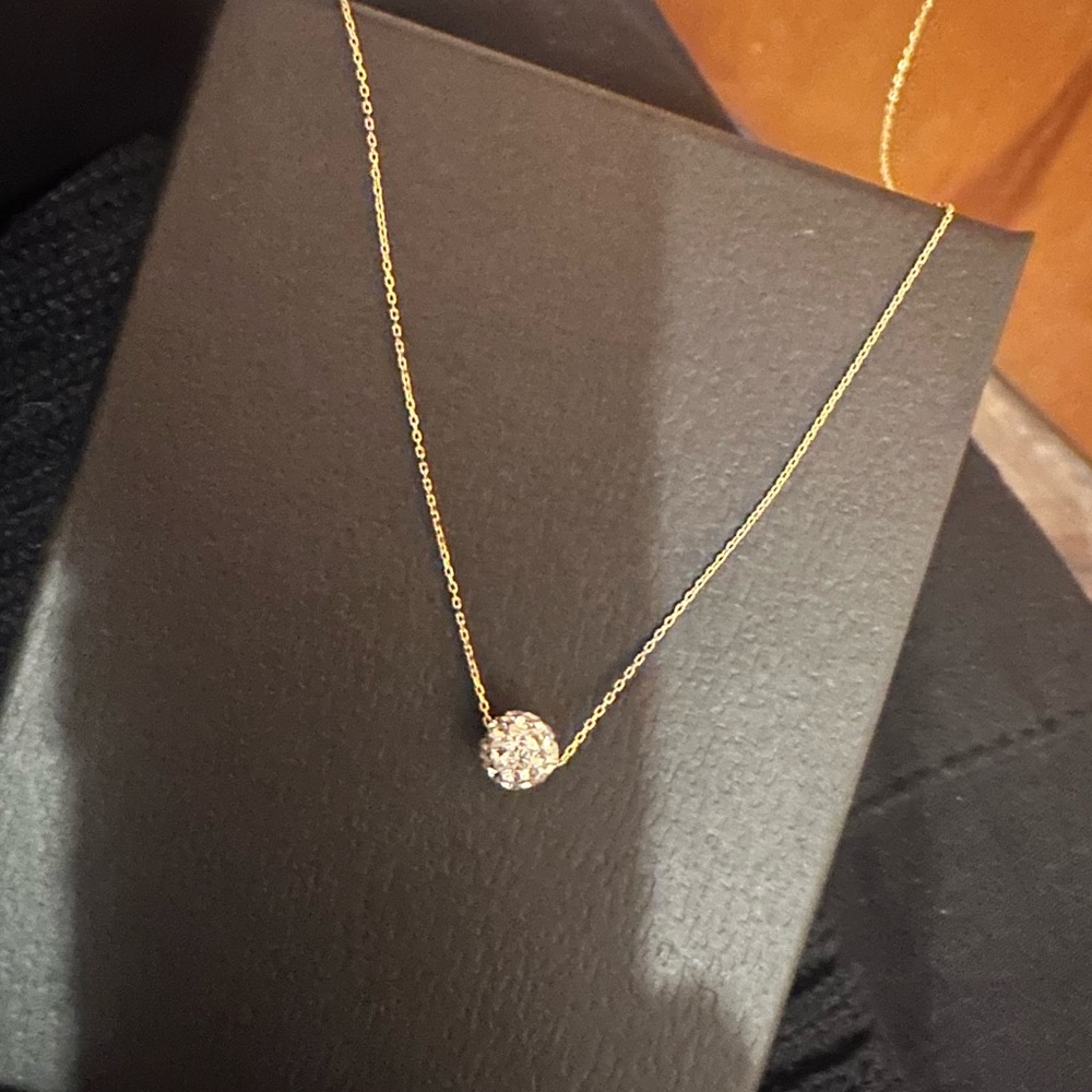 18” 14 kt gold chain with cubic zirconia fireball